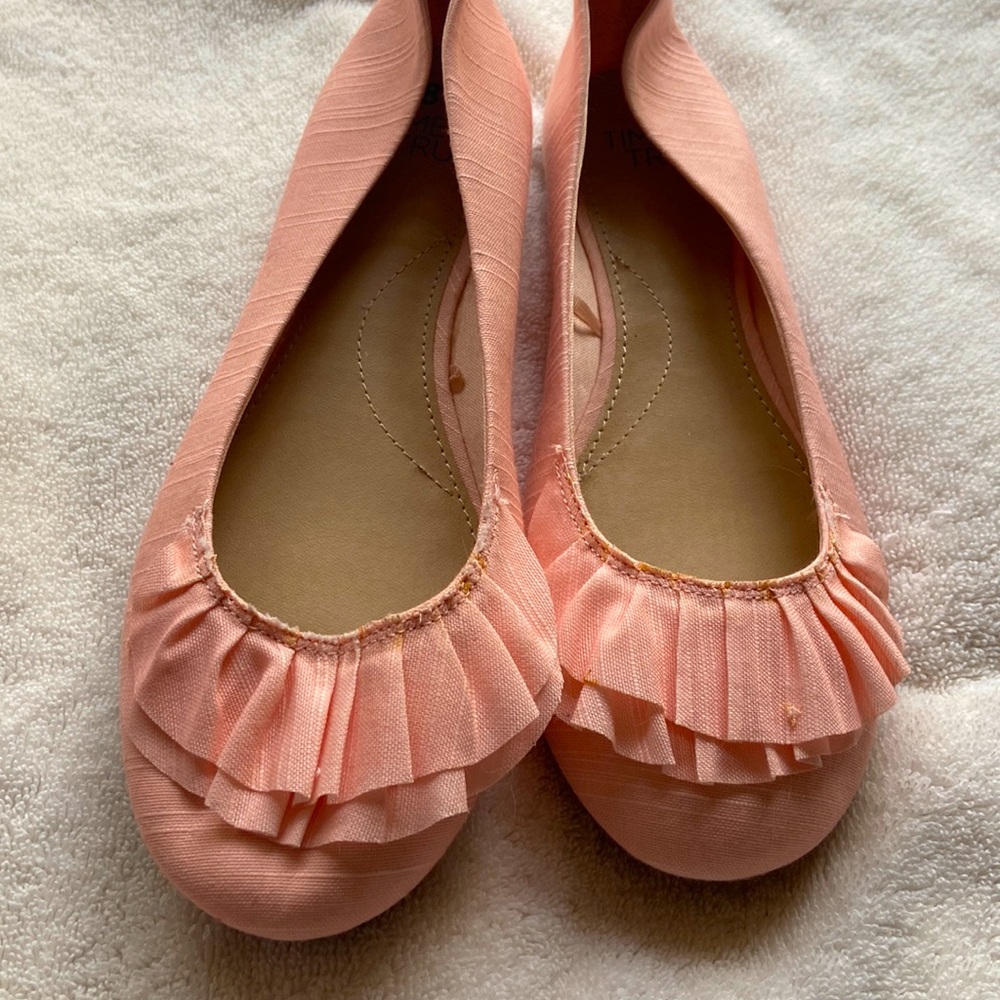 Pink ballet flats.